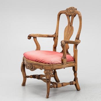 A rococo armchair, mid 18th Century.