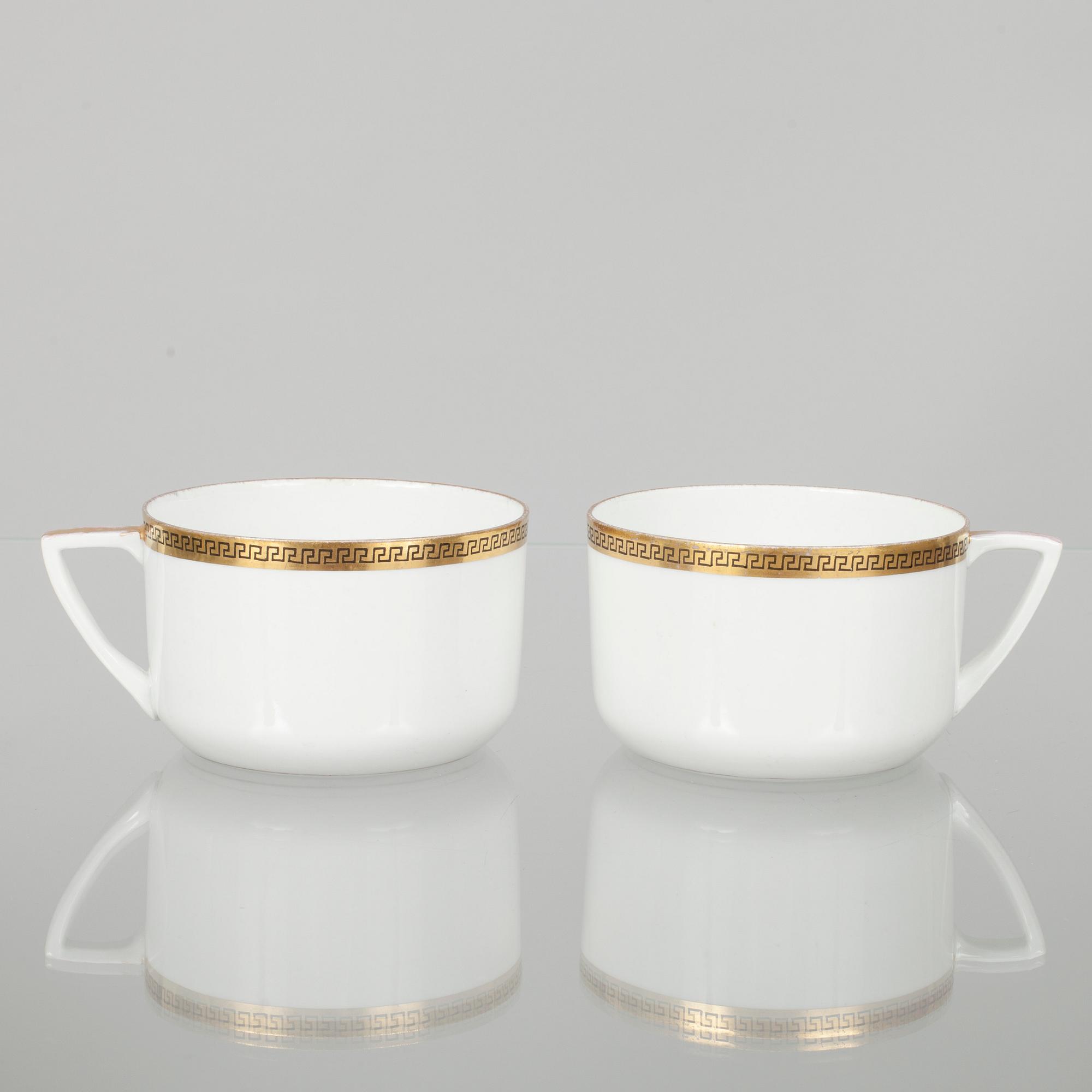 TEKOPPAR MED FAT, ett par, porslin, Kuznetsov, Ryssland 1891-1917.