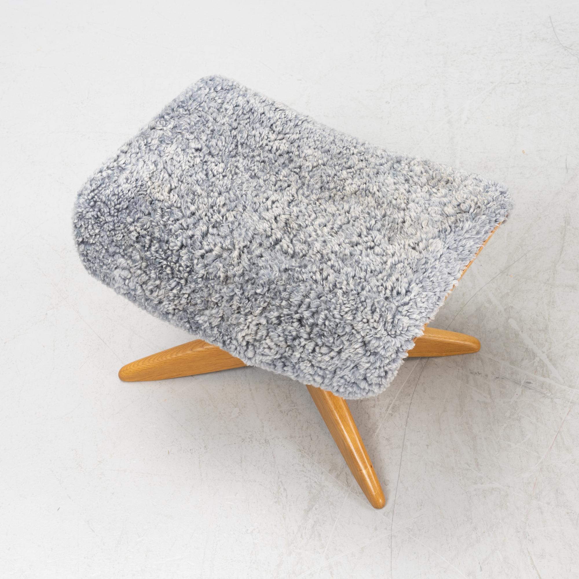 An 'Air' armchair with ottoman, Conform, 21st century.