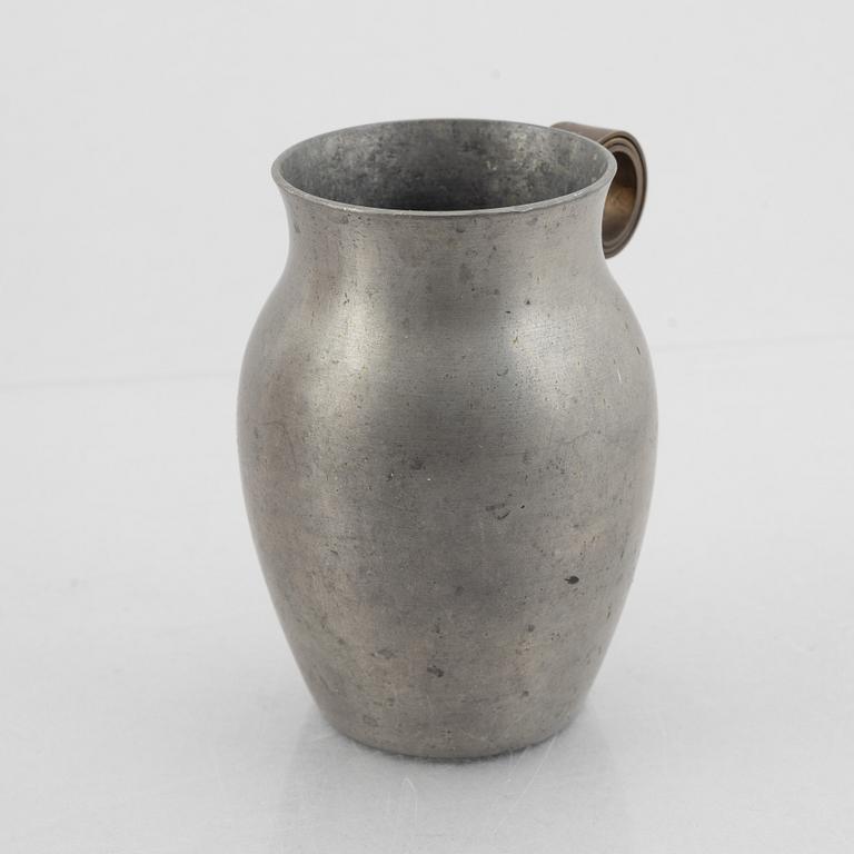 Nils Fougstedt, a pewter and brass vase, model "A 1240", Firma Svenskt Tenn, Stockholm 1939.