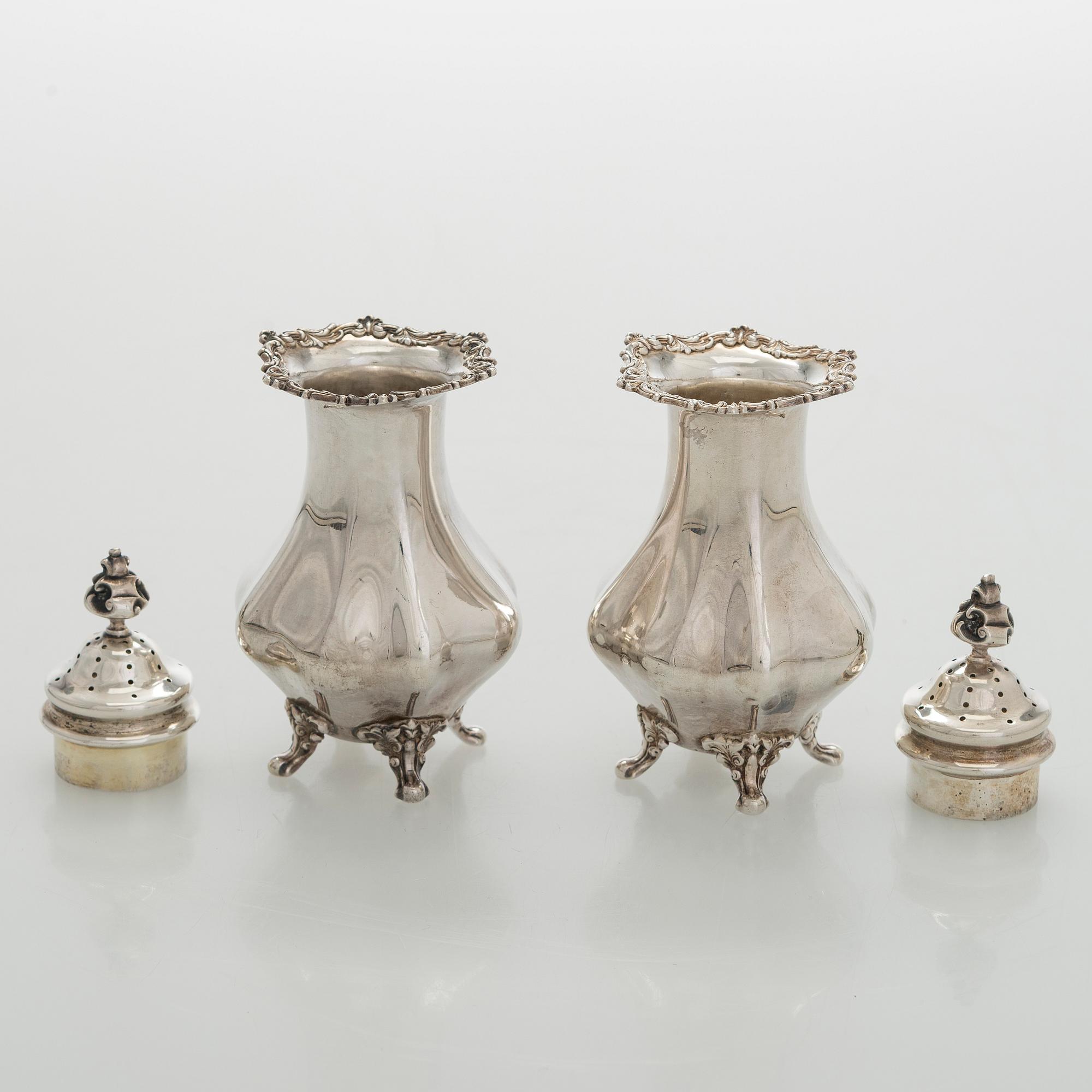 Black Starr & Frost, a pair of sterling silver shakers and sugar bowls, USA around 1900, Gorham pair of sterling spoons.