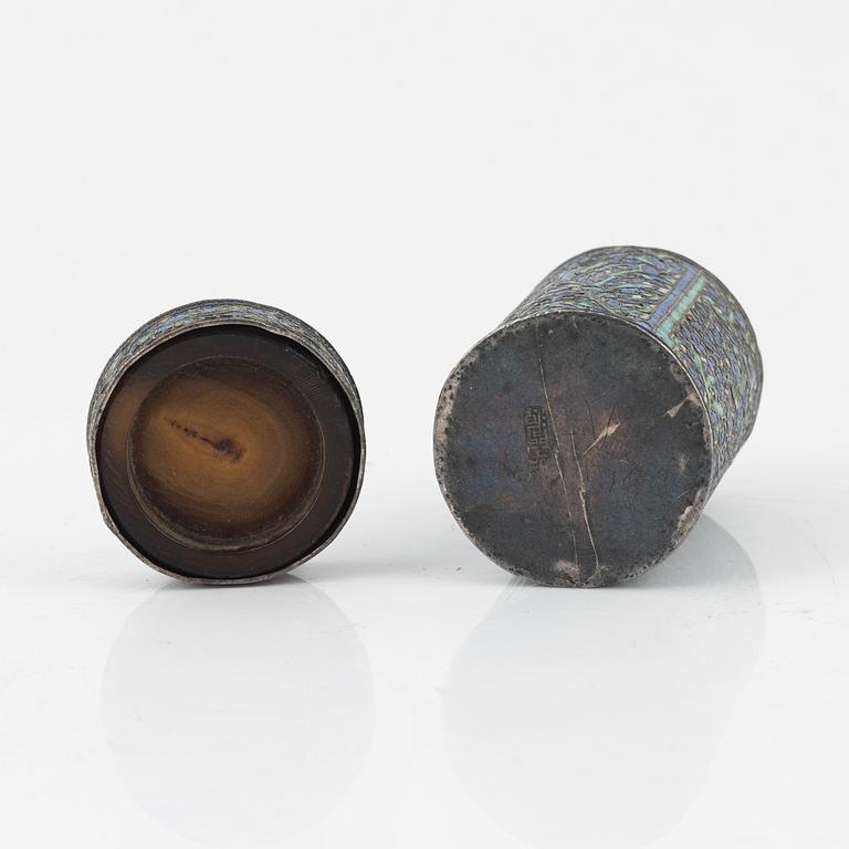 A set of four stone scholars objects and a enameled silver box with cover, Qing dynasty, circa 1900.