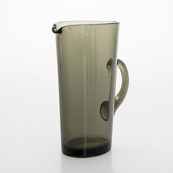 Kaj Franck, Drinking glasses, 18 pcs, 1725, "Trumpetti", and a jug, model 5605. Nuutajärvi Notsjö, Finland. 1960s.
