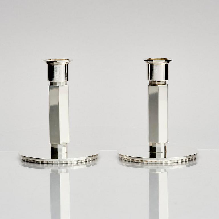 Wiwen Nilsson, a pair of sterling silver candlesticks, Lund, Sweden 11957 and 1960.