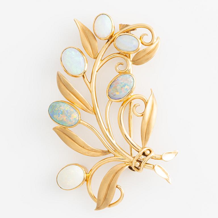 Brooch 18K gold with opals.