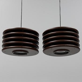 A par of 1970's ceiling lights.