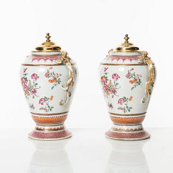 A pair of famille rose jars with gilded silver covers, Qing dynasty, Qianlong (1736-95).