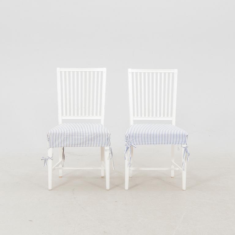 A set of 10 painted Gustavian style chairs from IKEA later part of the 20th century.