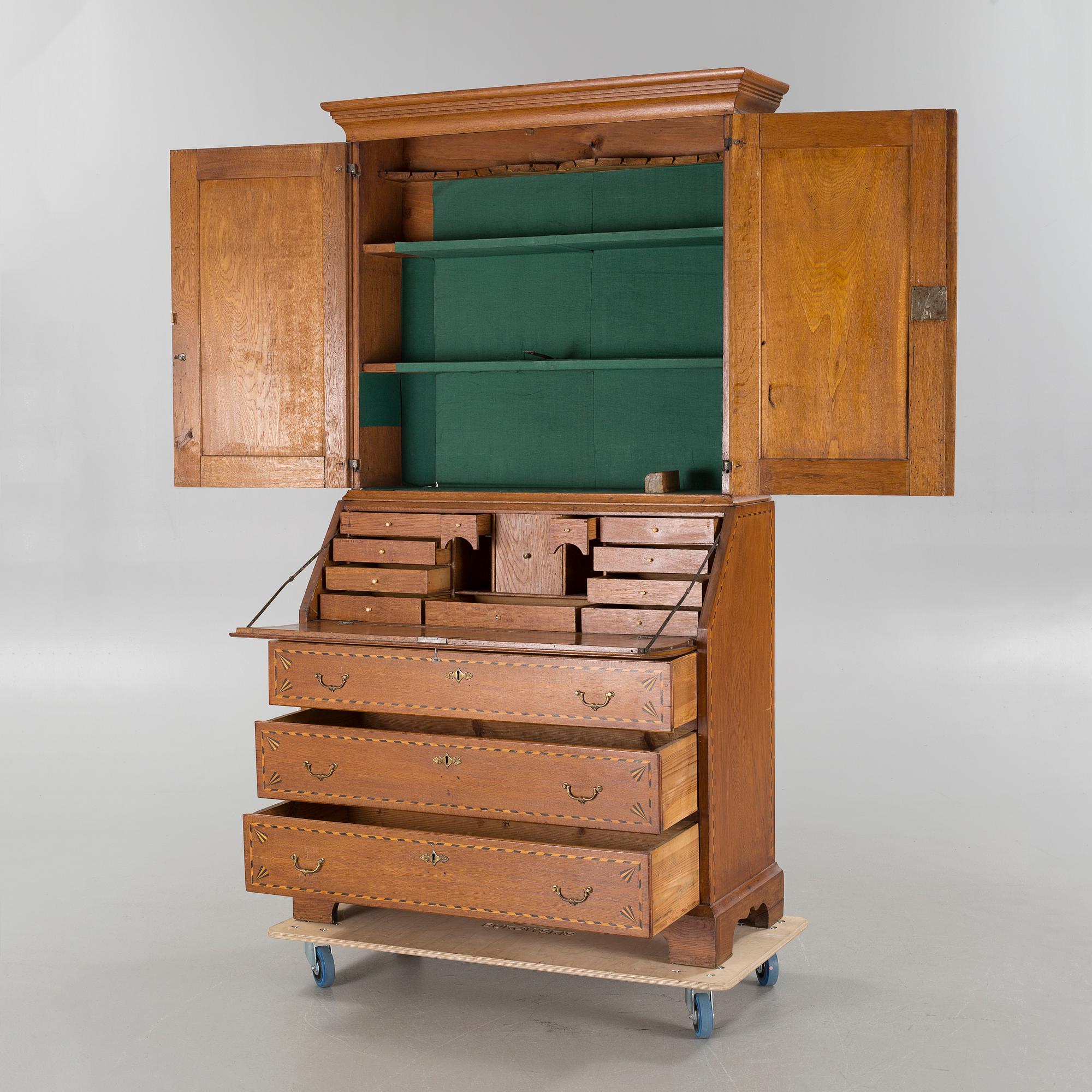A writing cabinet, probably from Småland, first half of the 19th century.