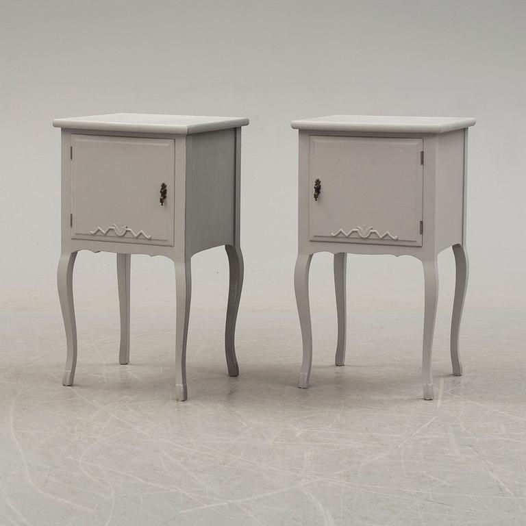 A pair of 20th century Rococo style bed side tables.