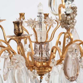 A Louis XV-style rock crystal eight-light chandelier, 20th century.