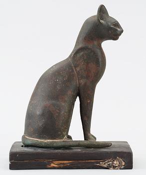 A bronze cat statuette, Egypt, possibly 22-30 Dynasty, 945-332 BC.