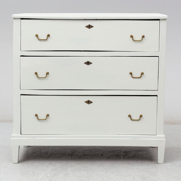 A 19th cnetury chest of drawers.