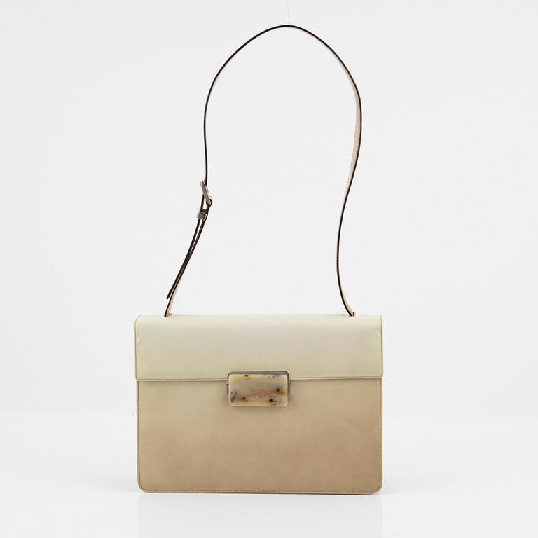 Prada, a beige patent leather bag.