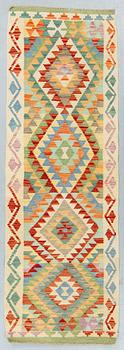 A runner, kilim, ca 199 x 66 cm.