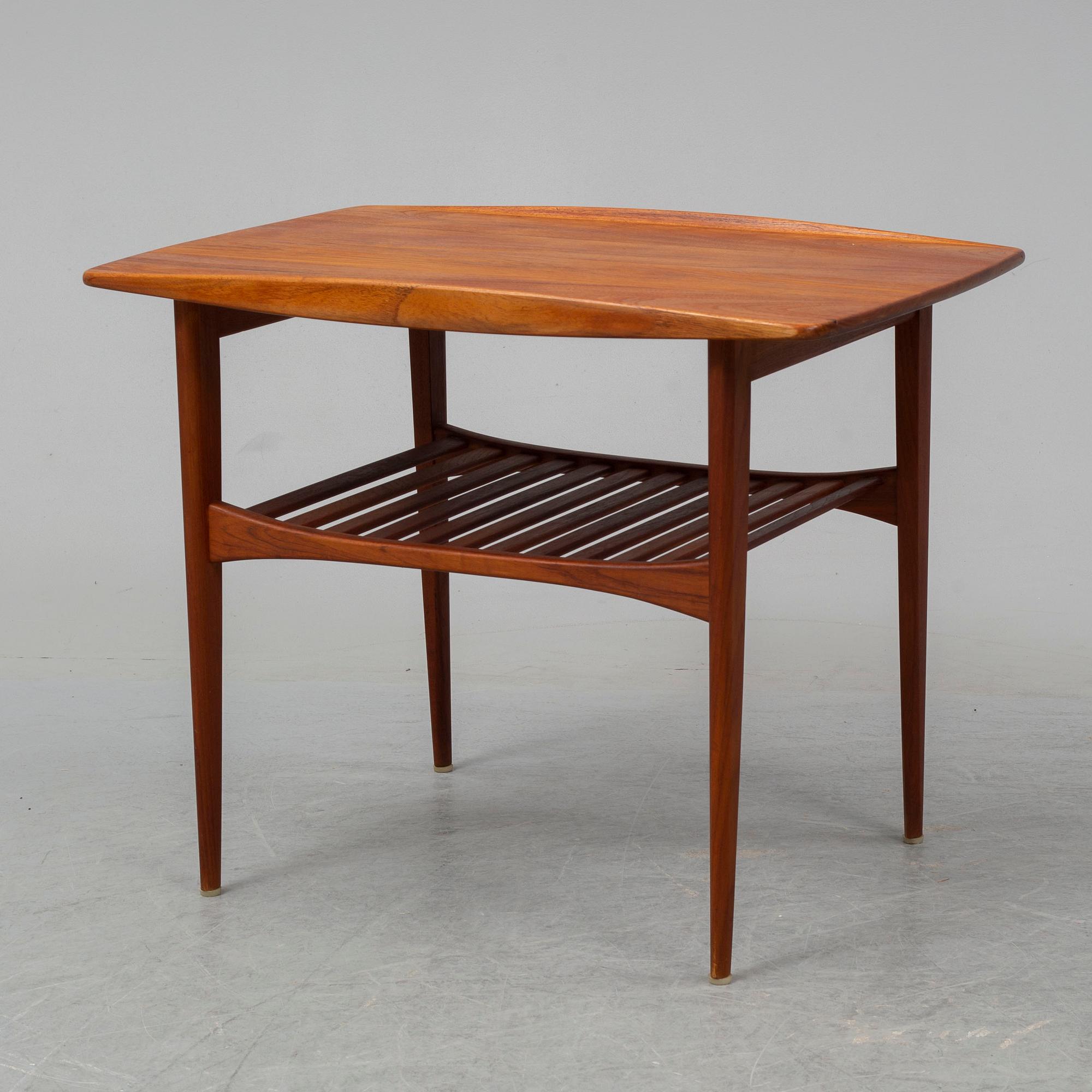 A teak coffee table, France & Daverkosen, Denmark.