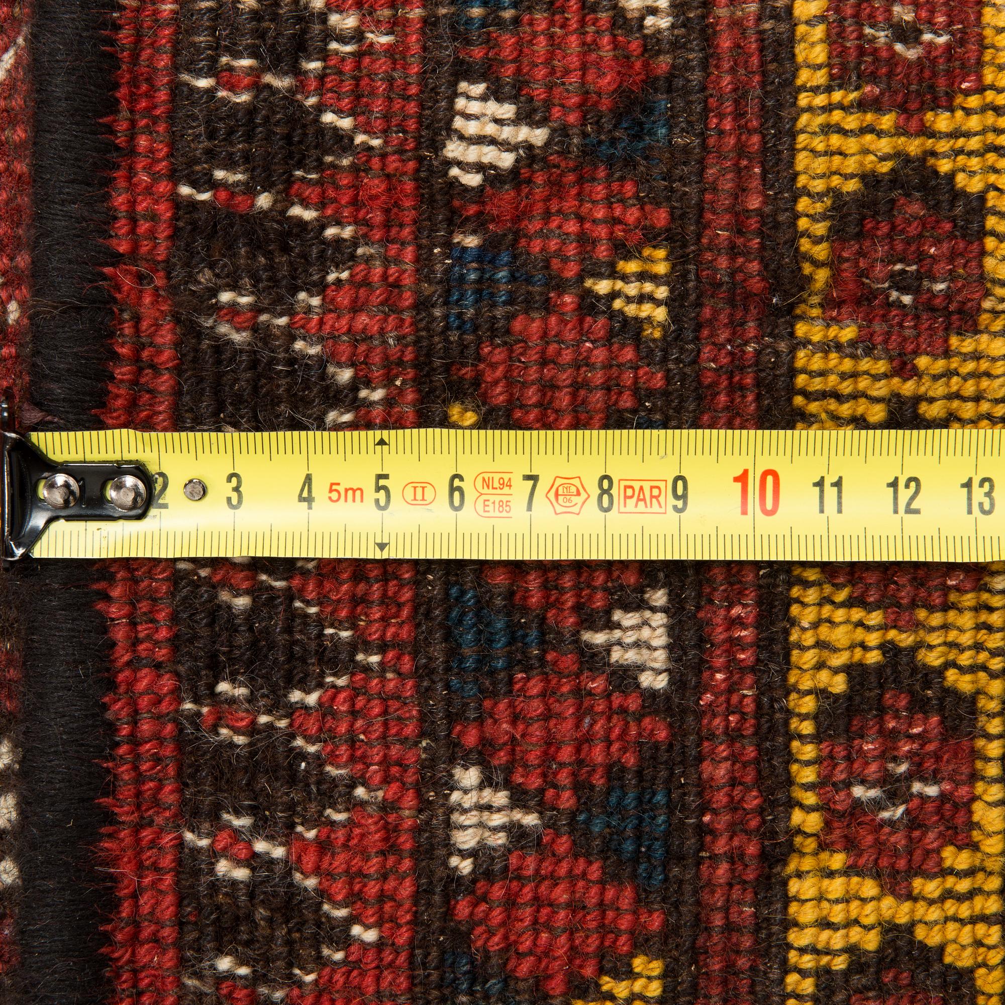 An Antique Beshir carpet, ca 183 x 390 cm.
