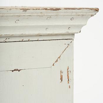 A Gustavian column-shaped cabinet, circa 1800.