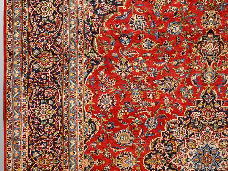 A carpet, Kashan signed, ca 425 x 304 cm.
