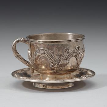 An export silver cup and saucer, probably Shanghai, early 20th century.