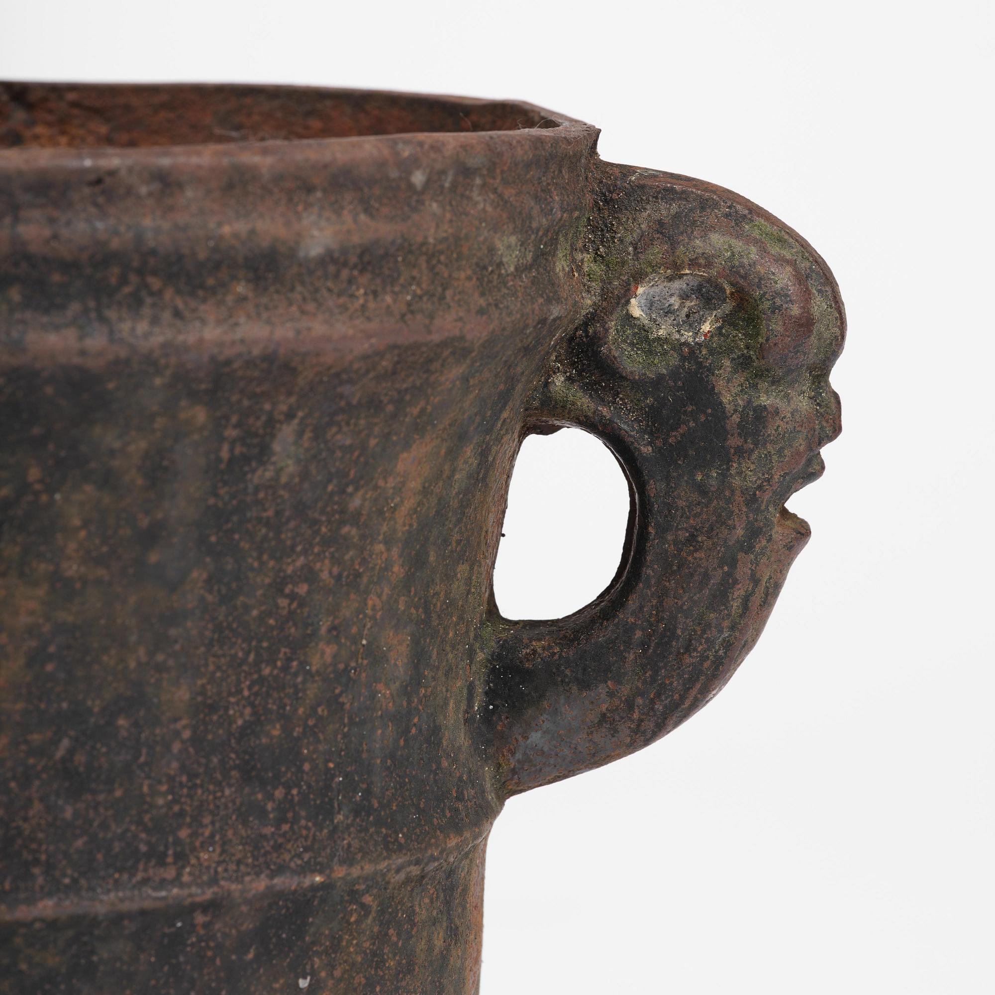 A pair of Swedish cast-iron garden urns, 18th century.