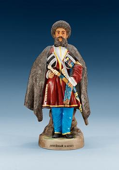 1348. A Russian figure of Cossack frontier-guard, Gardner porcelain manufactory, ca 1900.