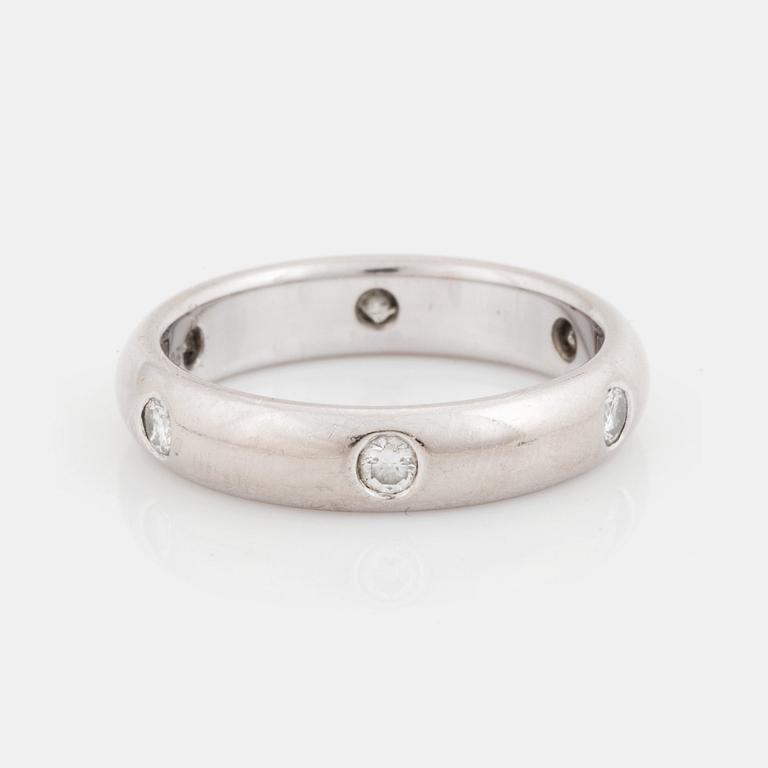 An 18K white gold Cartier ring set with round brilliant-cut diamonds.