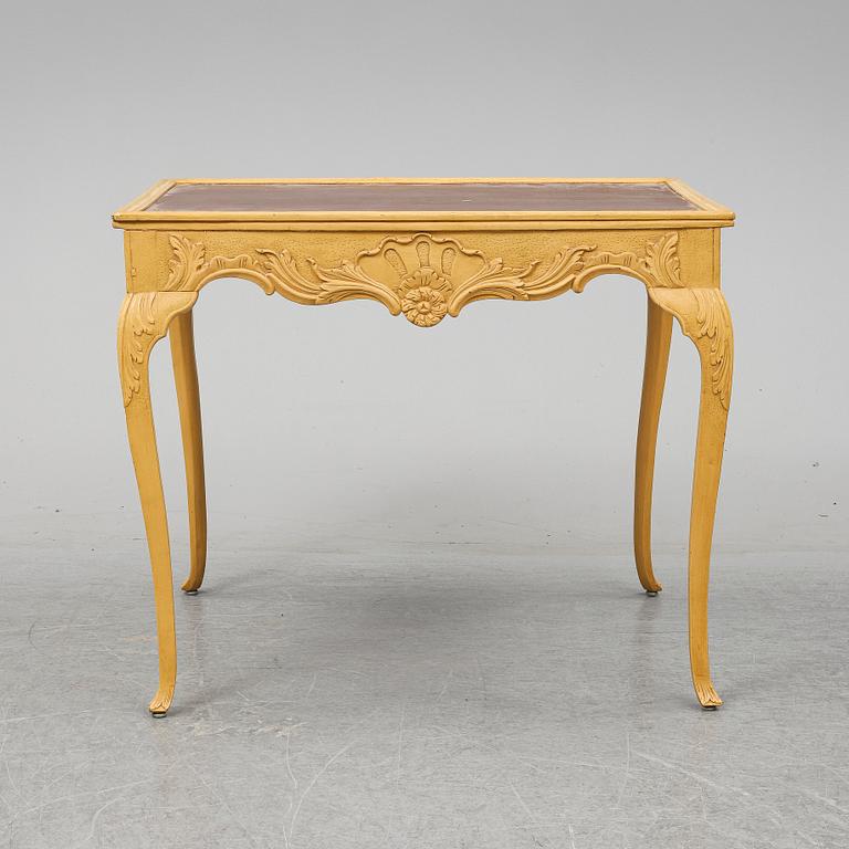 A presumably rococo style 19th century table.