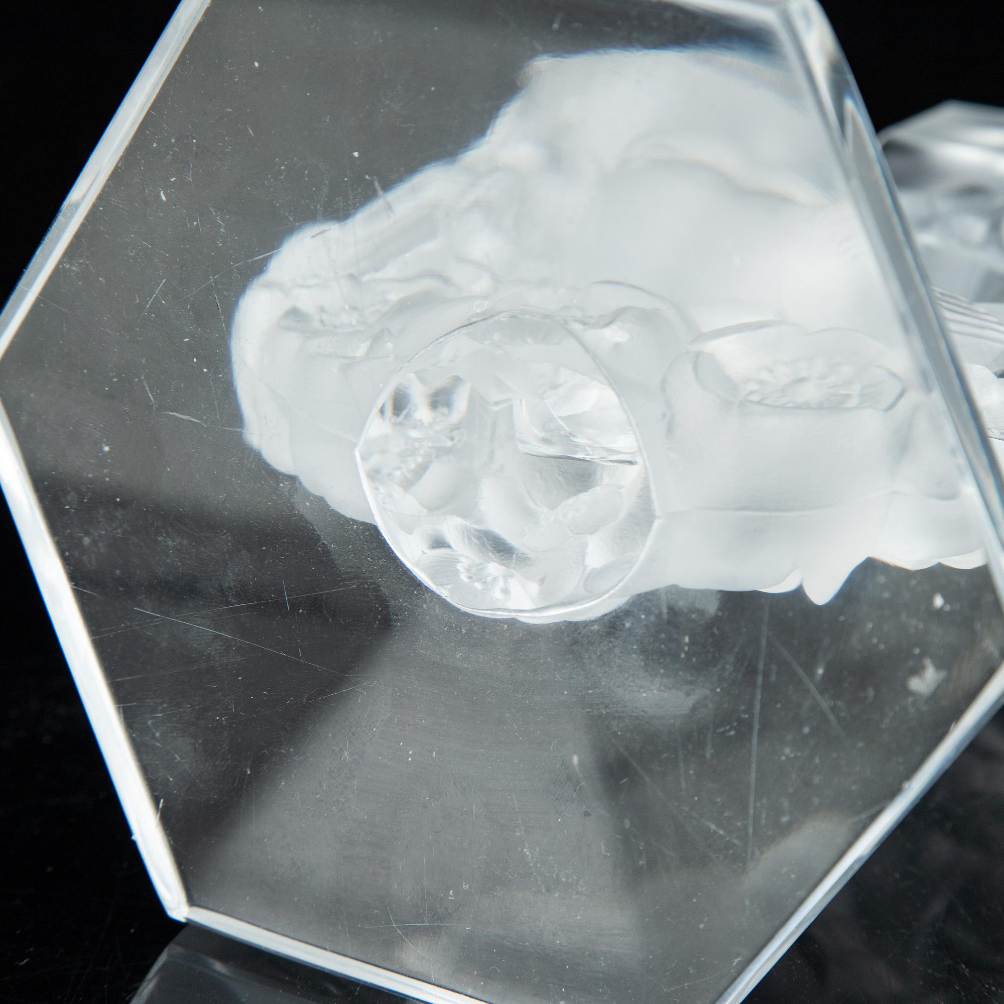 Lalique, a pair of glass candlestick, signed Lalique France, second half of the 20th century.