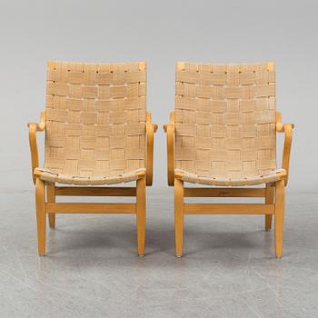 A pair of 'Eva' easy chairs by Bruno Mathsson, Firma Karl Mathsson, Värnamo 1973.