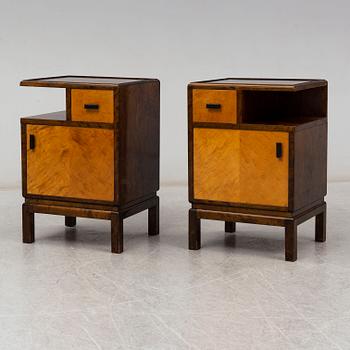 A pair of 1930s bedside tables.