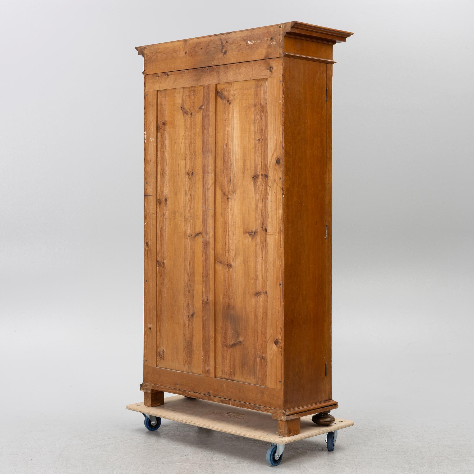 Bookcase, around the year 1900.