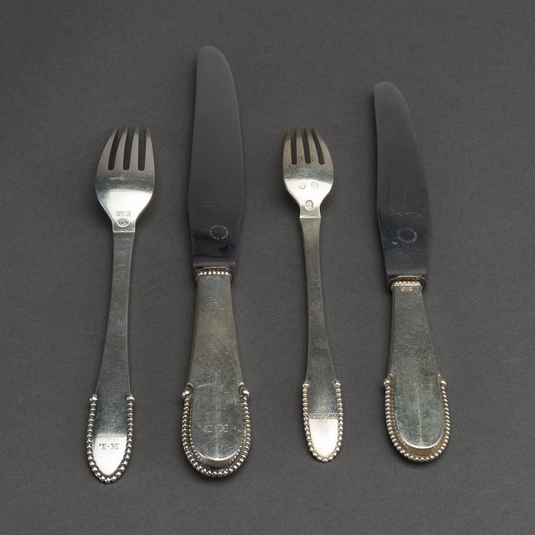 A Danish 20th century set of 4 sterling cutlery mark of G Jensen Copenhagen 1925 total weight ca 229 gr.