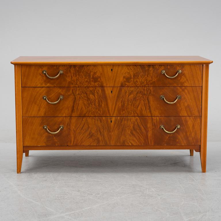 A Swedish Modern mahogany chest of drawers, 1940's/50's.