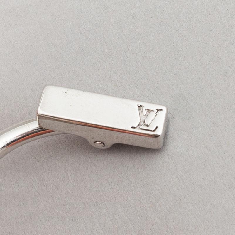 Louis Vuitton and Giorgio Armani, two pairs of cufflinks.