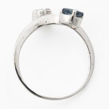 14K white gold ring with sapphire and small rubies.