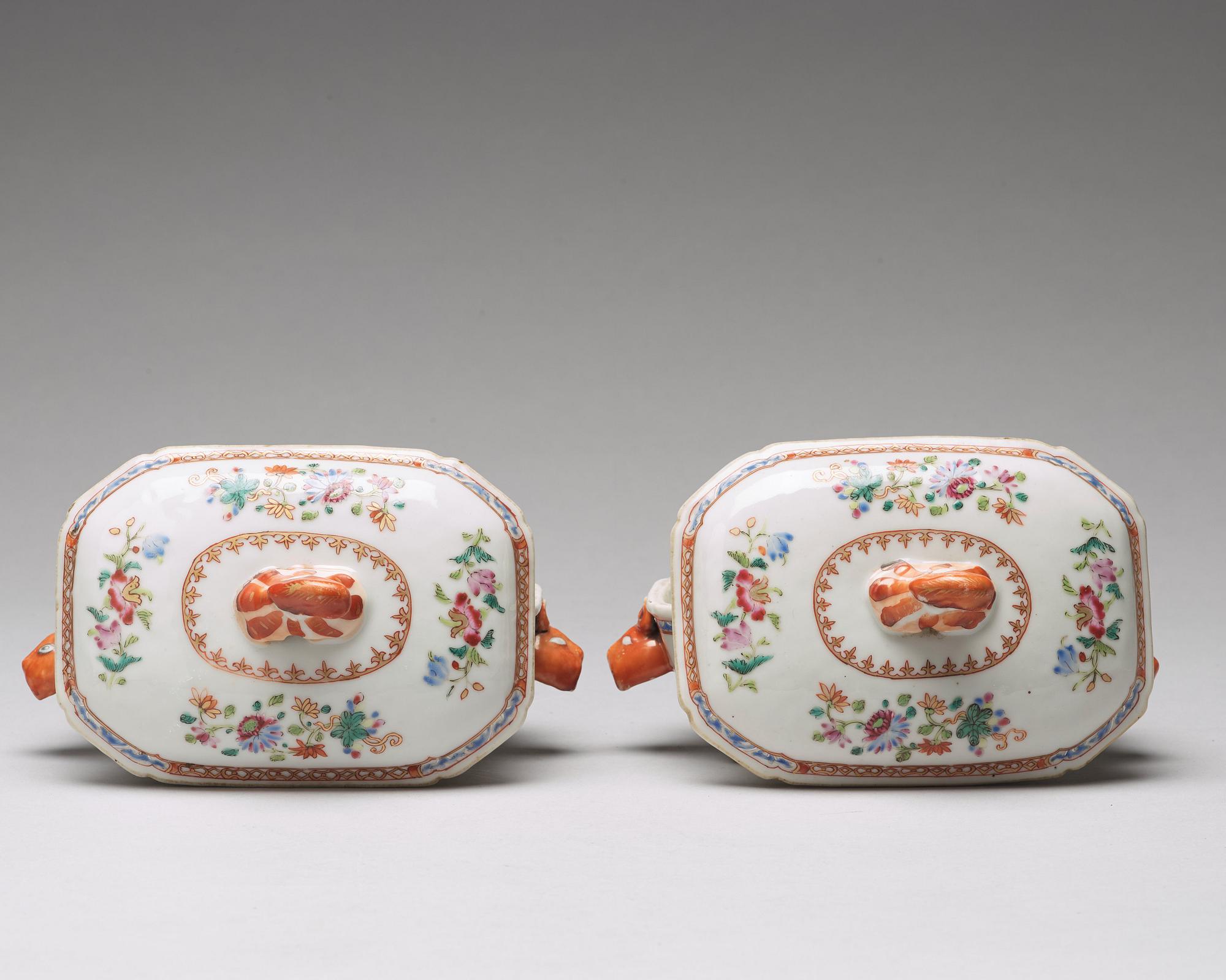 A pair of famille rose 'double peacock' butter tureens with covers and stands, Qing dynasty, Qianlong (1736-95).