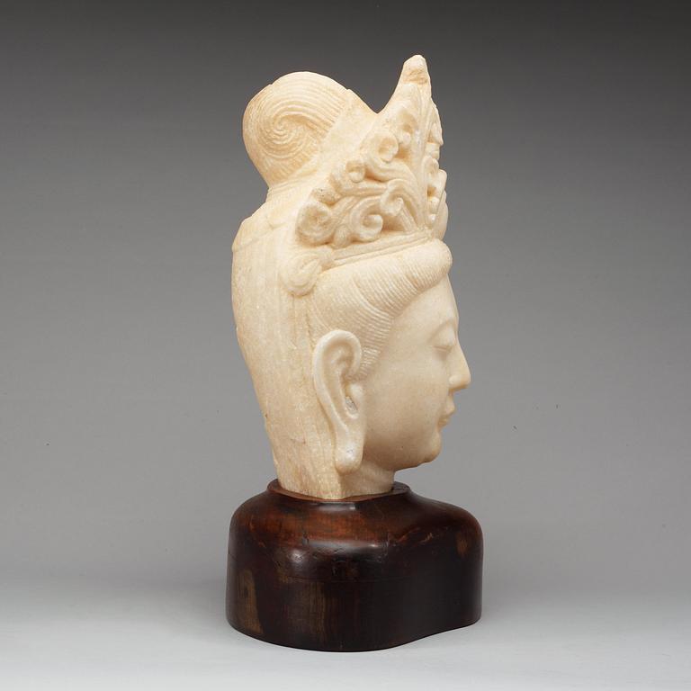 A marble sculpture of Guanyin, China.