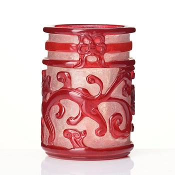 A ruby red overlay Beijing glass 'chilong' brush pot, with a seal mark.