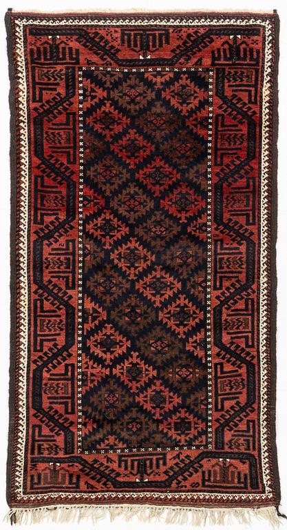 A rug, antique Baluch, ca 193 x 103 cm.