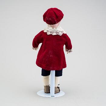 A bisque headed character boy doll, Germany, 1910s.