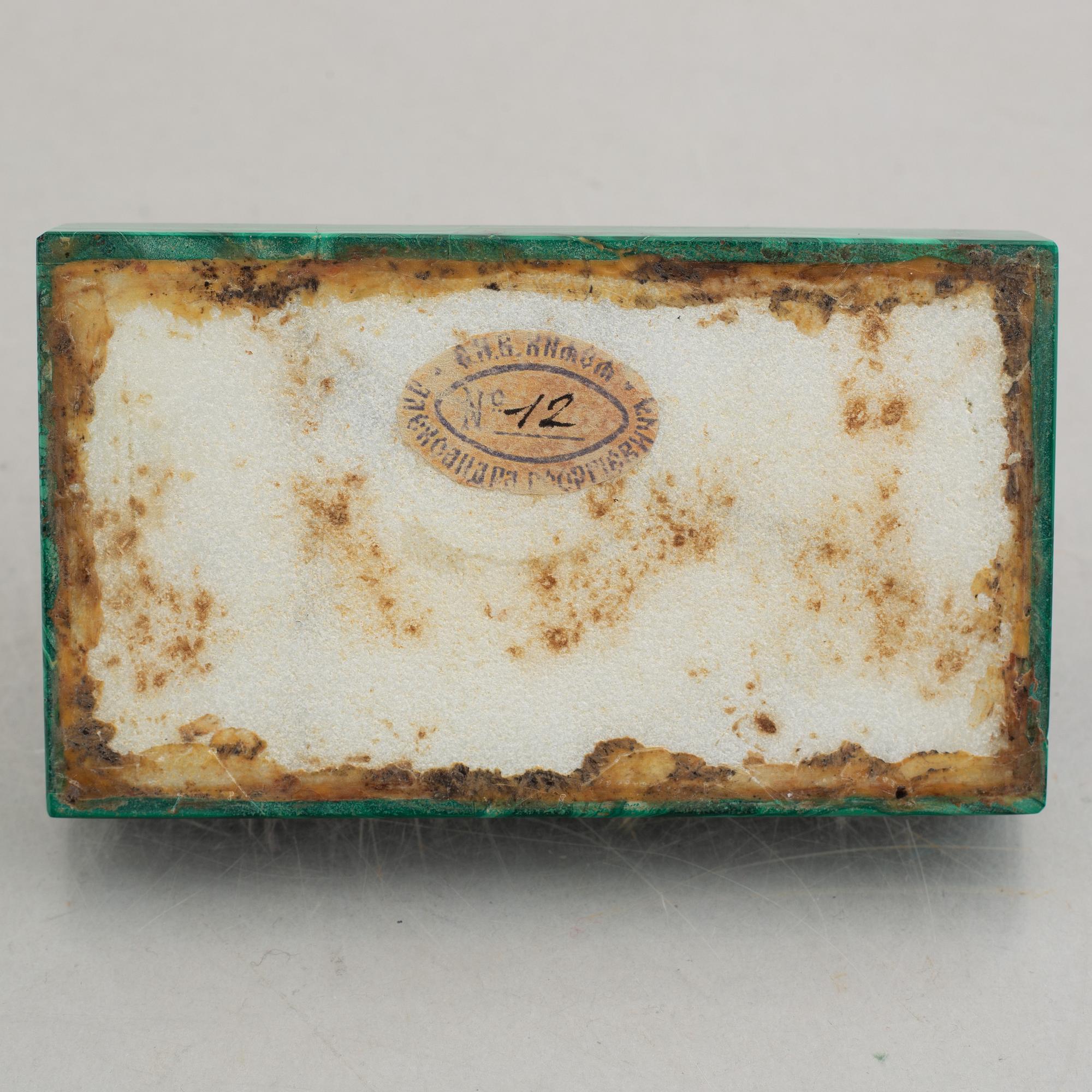 A Nicholas II malachite-veneered and bronze paperweight, late 19th century.