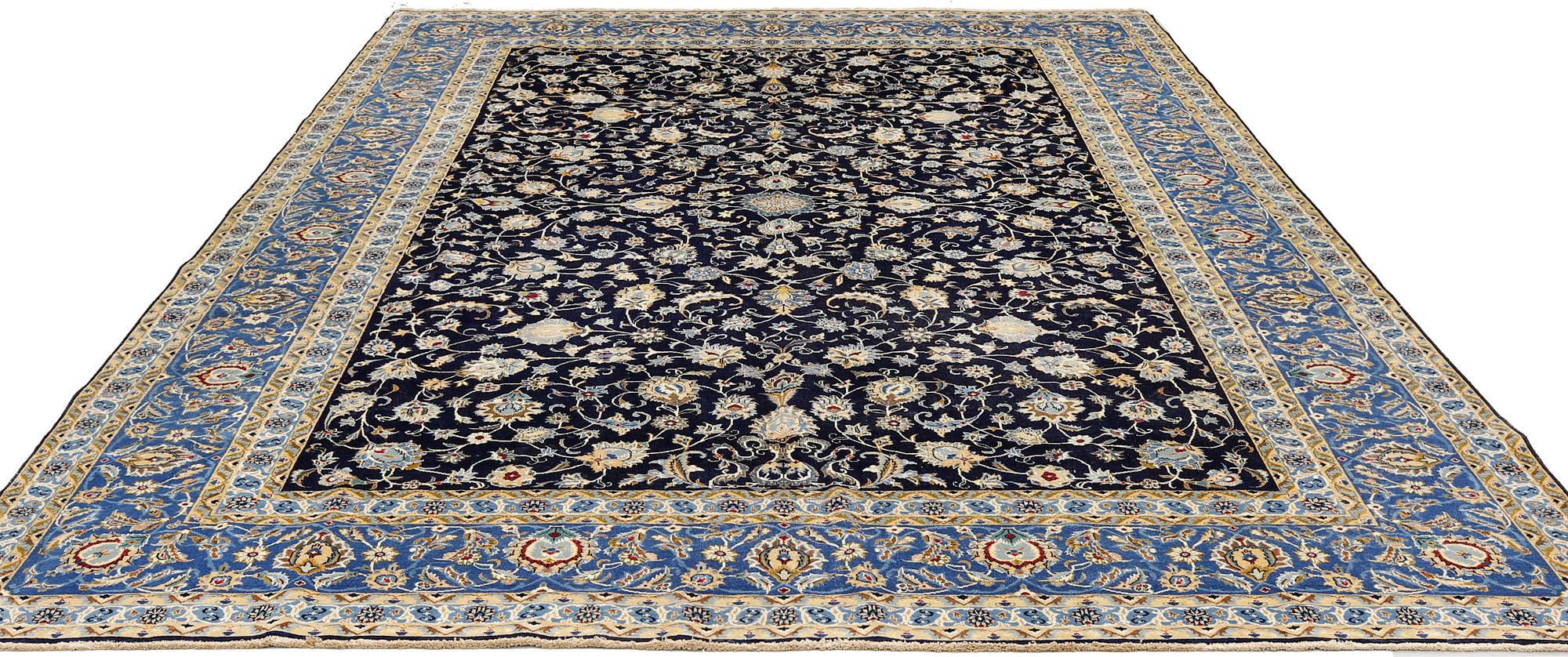 A Kashan carpet of 'Shah Abbas' design, c 376 x 276 cm.