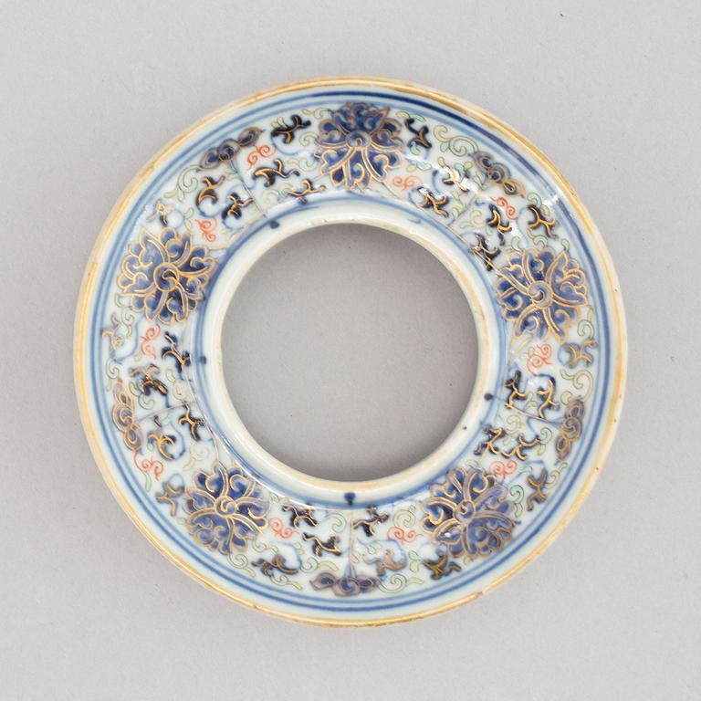 A porcelain stand for a cup, Qing dynasty, 19th Century.