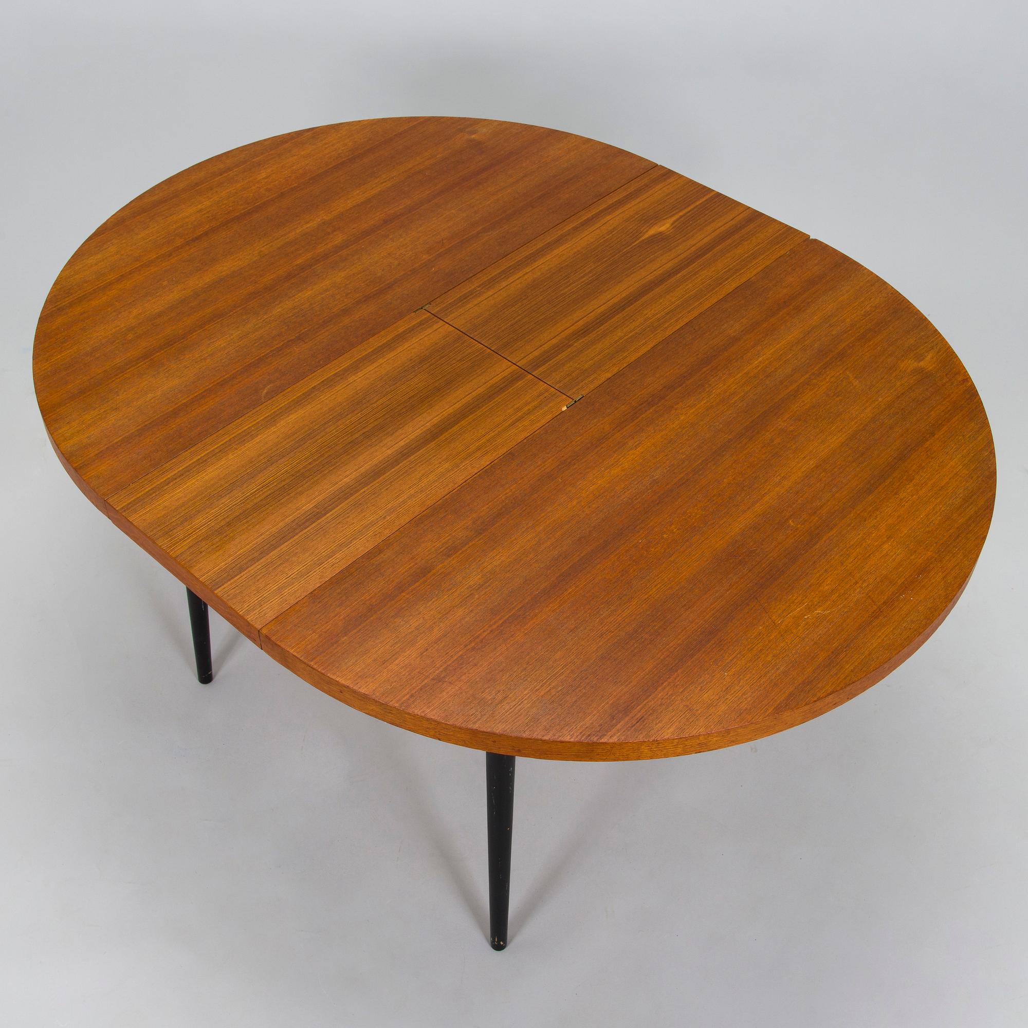 A mid-20th century dining table.