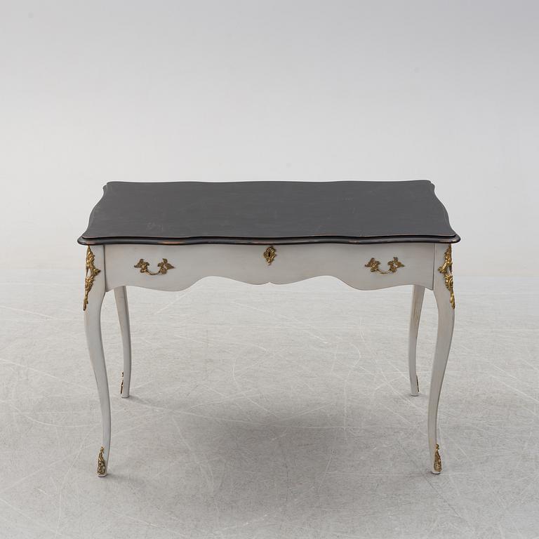 A rococo style table, mid 2th century.