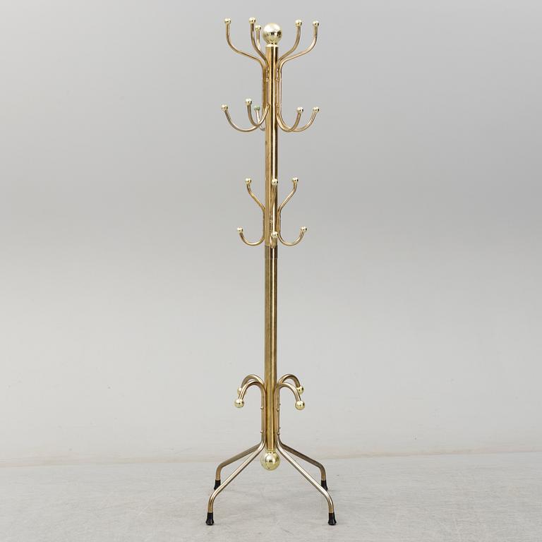 A late 20th century brass coat hanger.