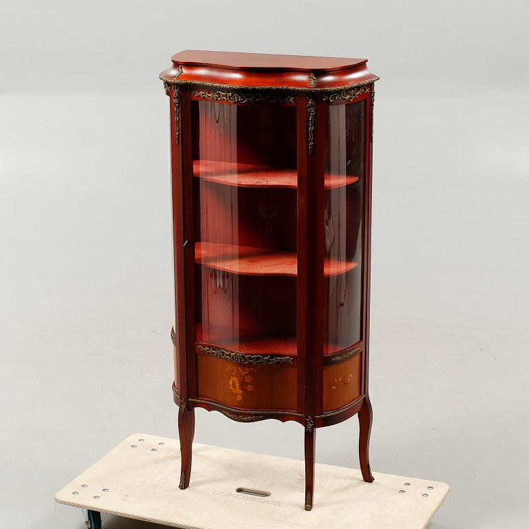 A mid 20th century glass cabinet.