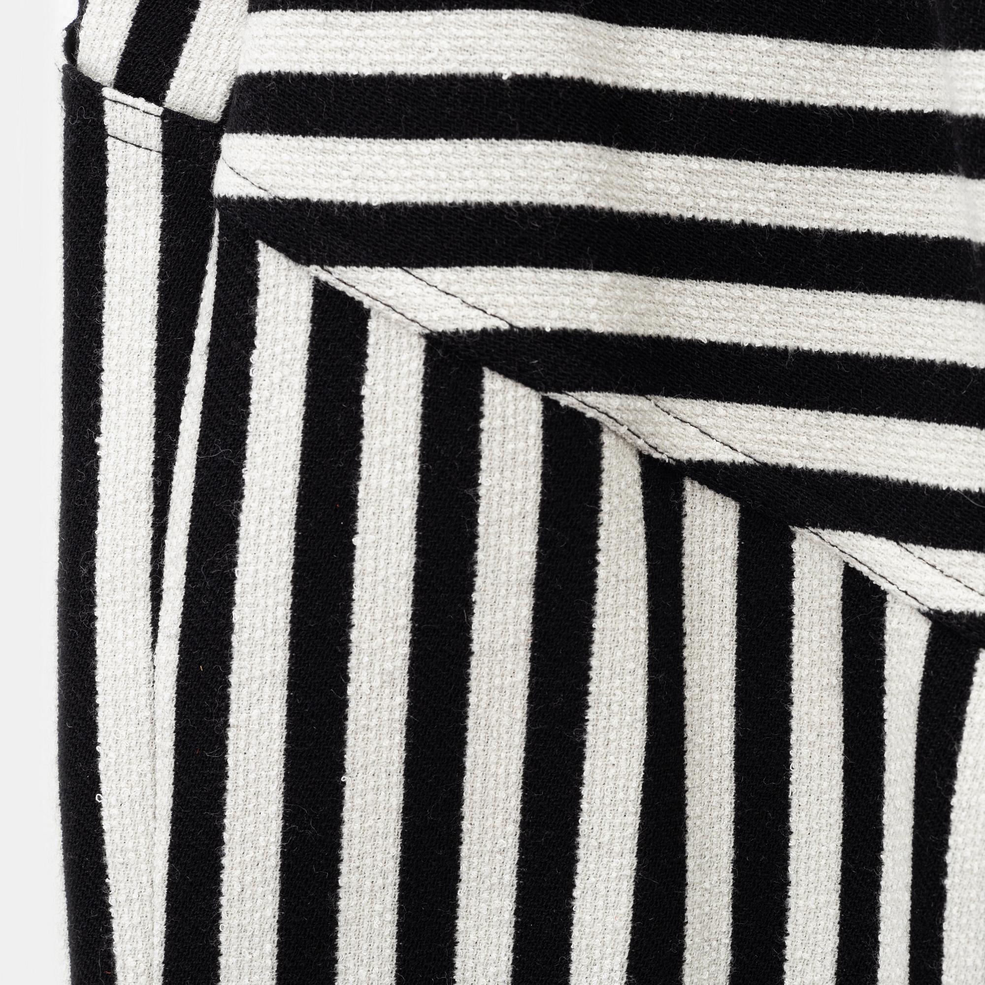 Chanel a pair of striped wool pants from Cruise Collection 2018 2019 La Pausa