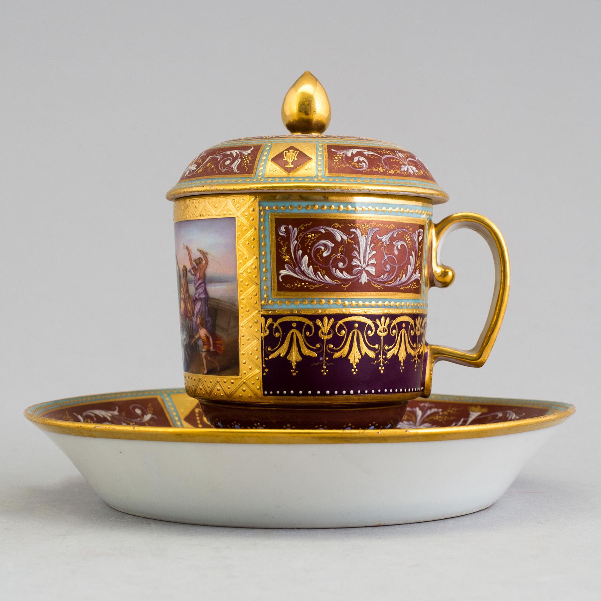 An early 19th century empire cup with saucer and cover with Wien mark.